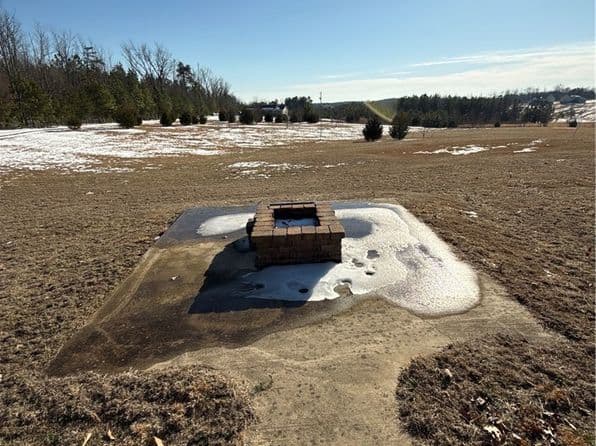 Fire pit area with open acreage beyond